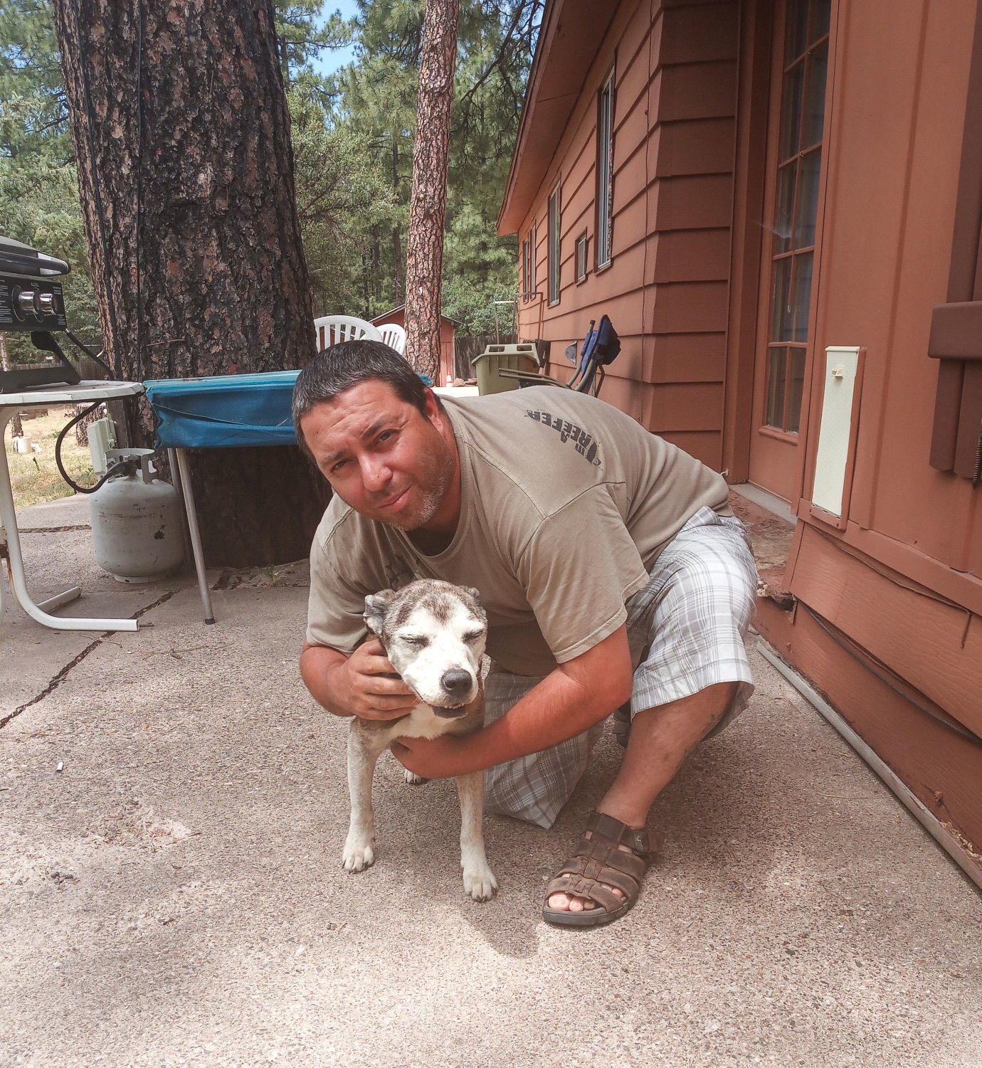Mike Hernandez hugs Sushi after their reunion